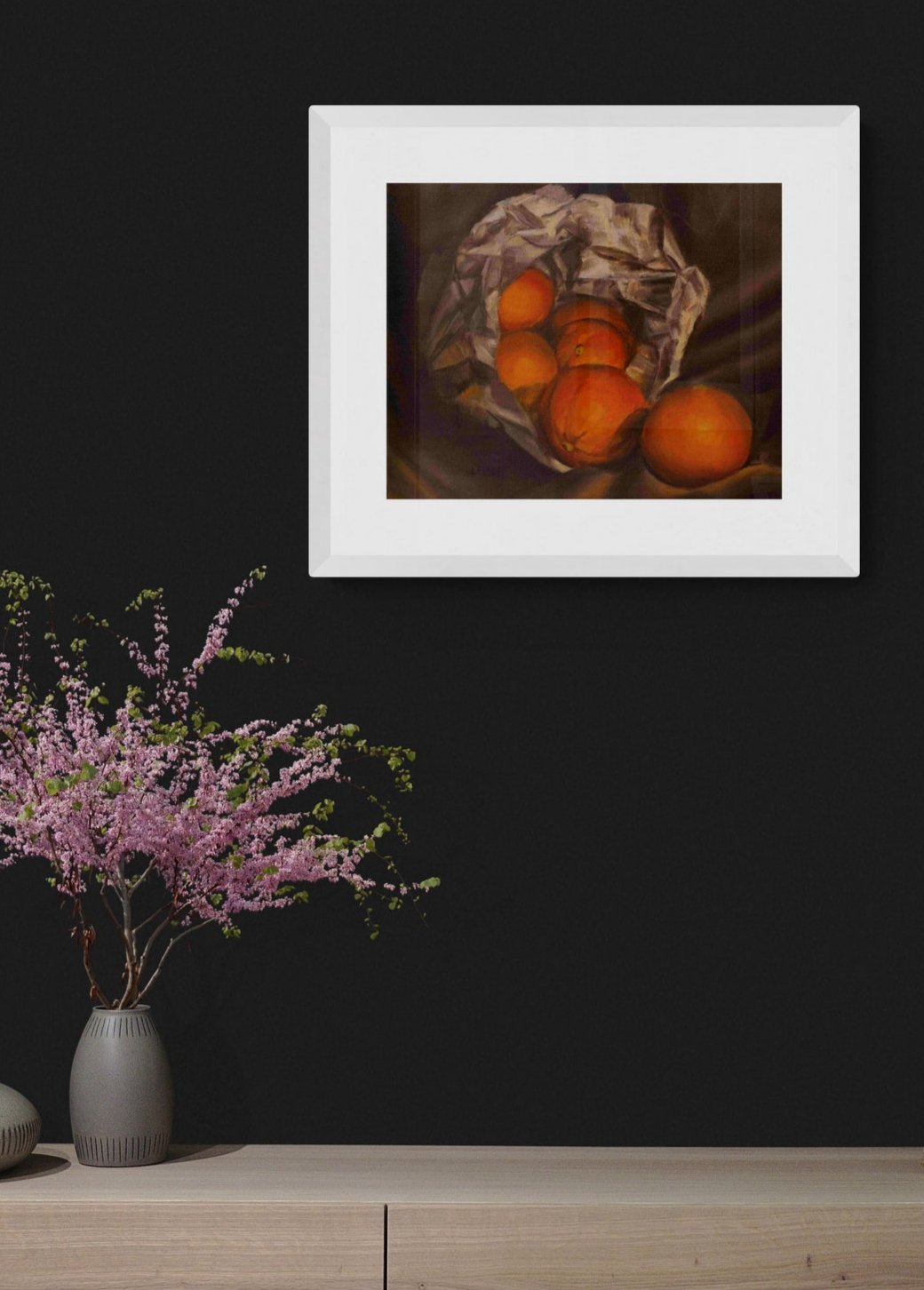 oil painting of oranges spilling out of a paper bag against a dark wall